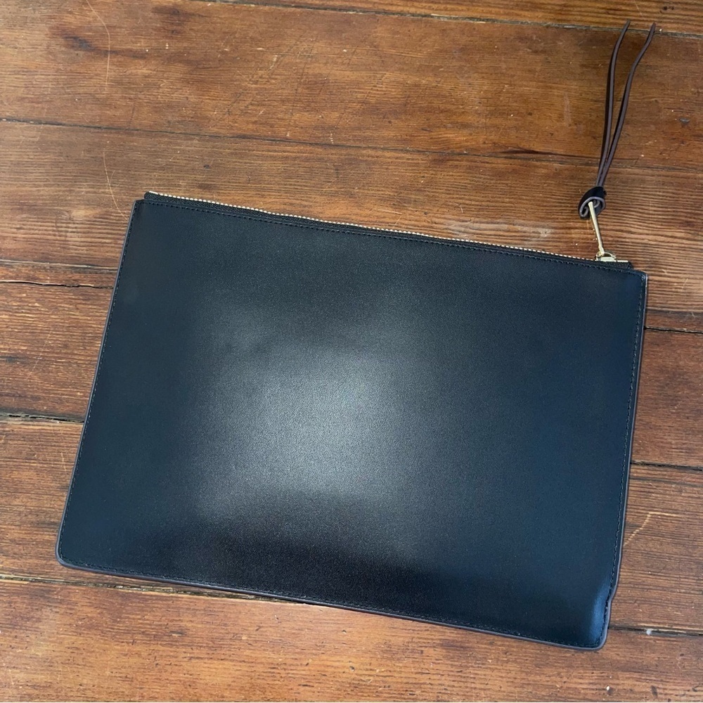 Elegant Black Clutch with gold tone hardware